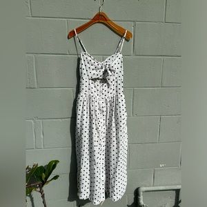 White and black polka dot midi dress.